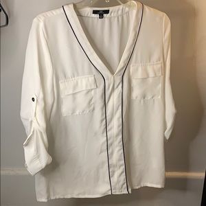 White v neck blouse with black trim